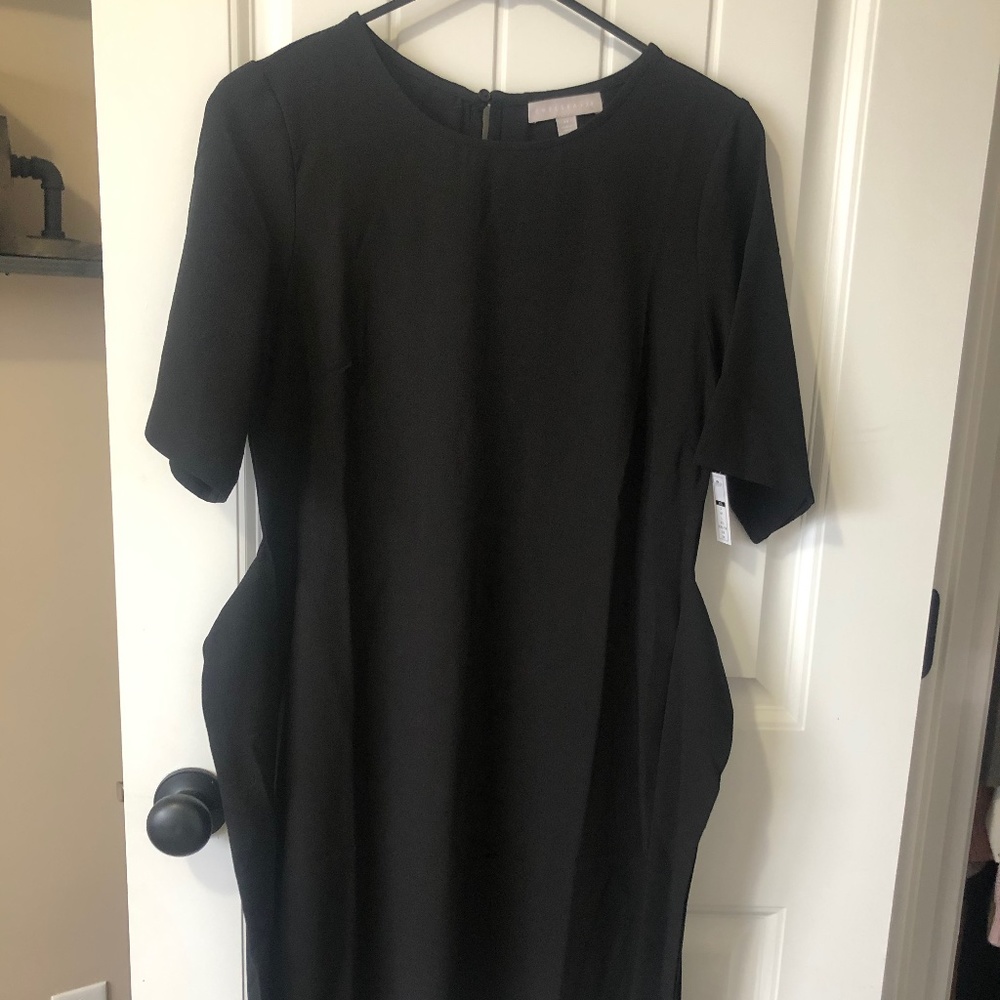Black dress with attached tie for bow